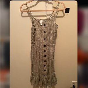 Green dress with white dots
